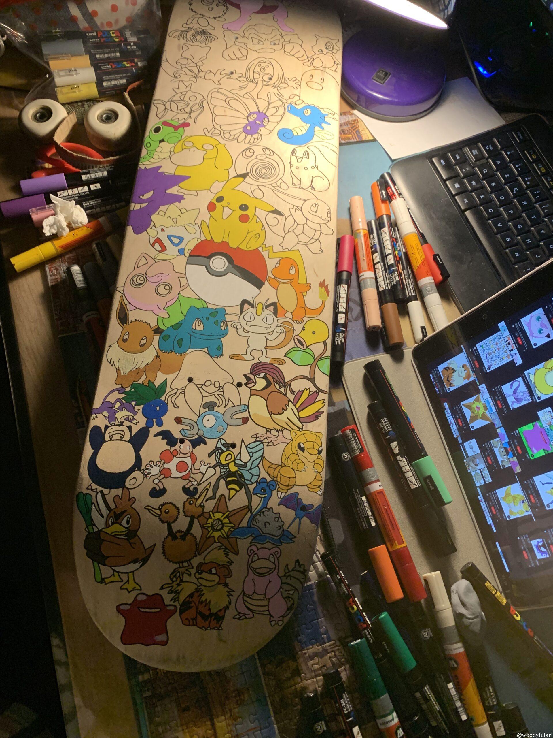 custom pokemon en cours sur planche de skateboard recyclé en objet décoratif - woodyfulart